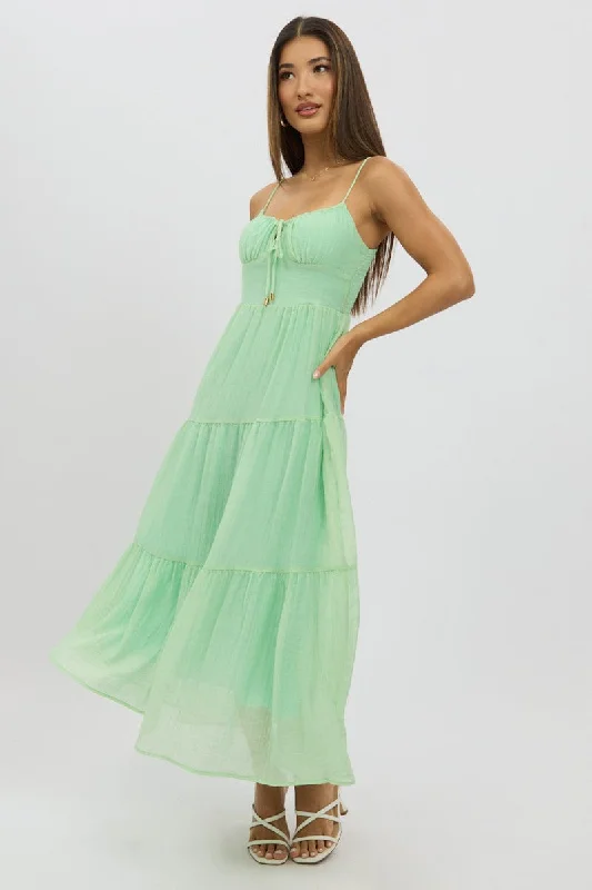 Midi dresses with tiered skirts for a bohemian festival look Green Midi Dress Tiered Strappy Midi dresses with tiered skirts for a bohemian festival look Green Midi Dress Tiered Strappy