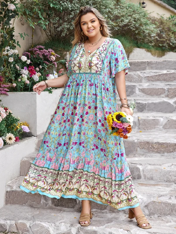  Plus Size Printed Tie Neck Flutter Sleeve Maxi Dress