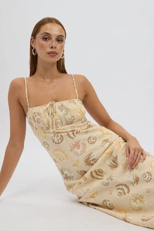 Midi dresses with geometric cutouts for a contemporary and edgy look Beige Abstract Midi Dress Strappy Midi dresses with geometric cutouts for a contemporary and edgy look Beige Abstract Midi Dress Strappy