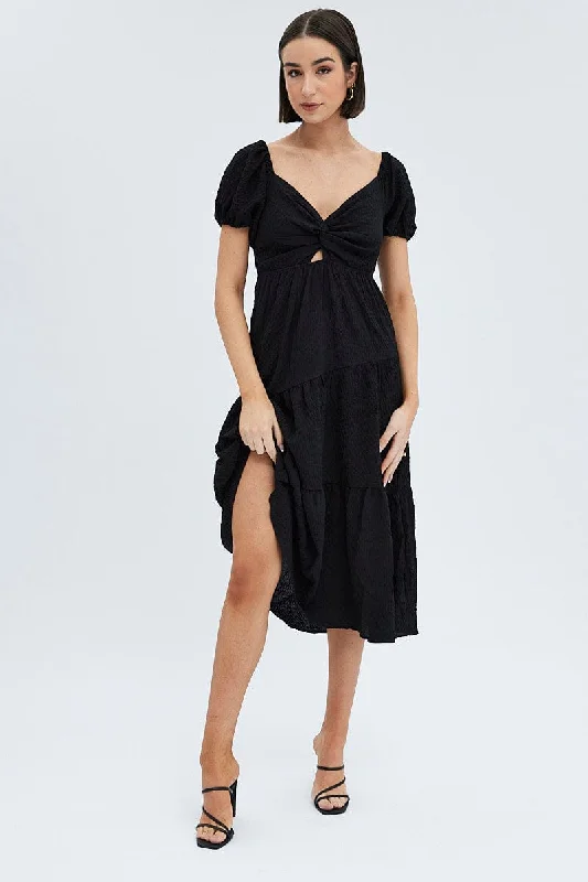 Midi dresses with fringe details for a fun and energetic style Black Midi Dress Short Sleeve Cut Out Midi dresses with fringe details for a fun and energetic style Black Midi Dress Short Sleeve Cut Out