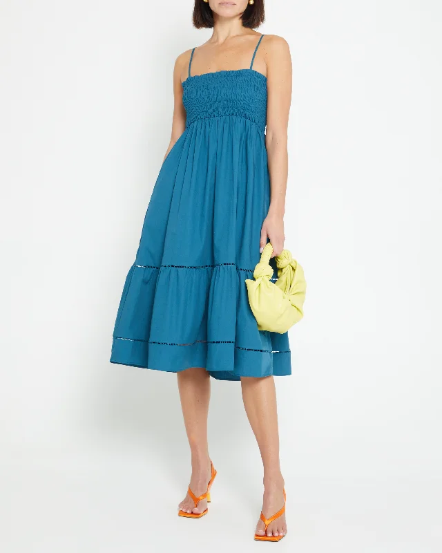Midi dresses with pom - pom trims for a playful and festive lookCotton Leila Dress