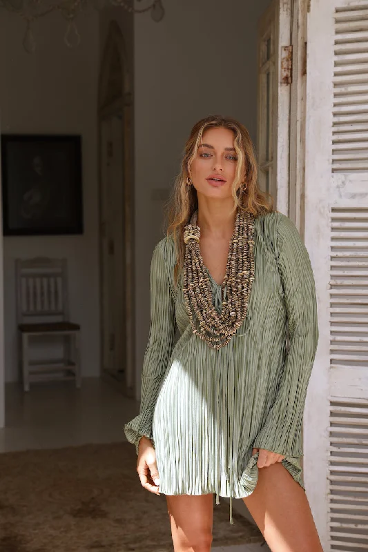 Mini dresses with pocket details for added functionalityTwist And Turns Dress Green
