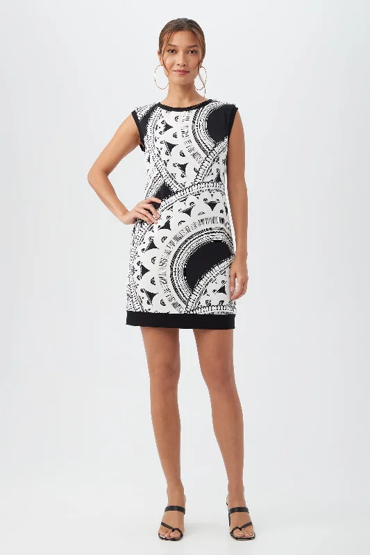 Mini dresses with pom - pom trims for a playful feelZinnia Dress